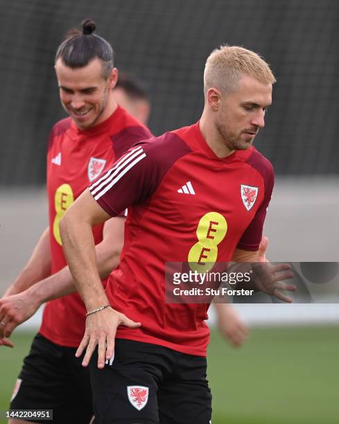 Wales captain Gareth Bale with Aaron Ramsey during the Wales Training Session at Al Sad Sports Club on November 17, 2022 in Doha, Qatar.