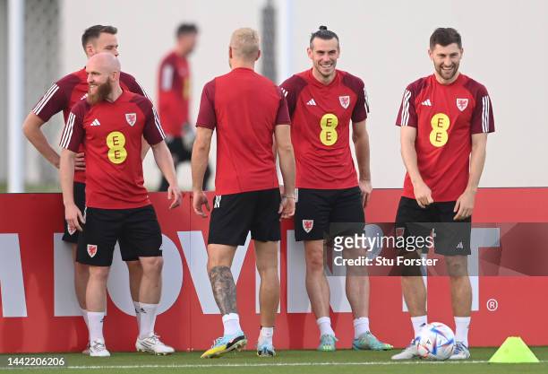 Wales captain Gareth Bale shares a joke with team mates during the Wales Training Session at Al Sad Sports Club on November 17, 2022 in Doha, Qatar.