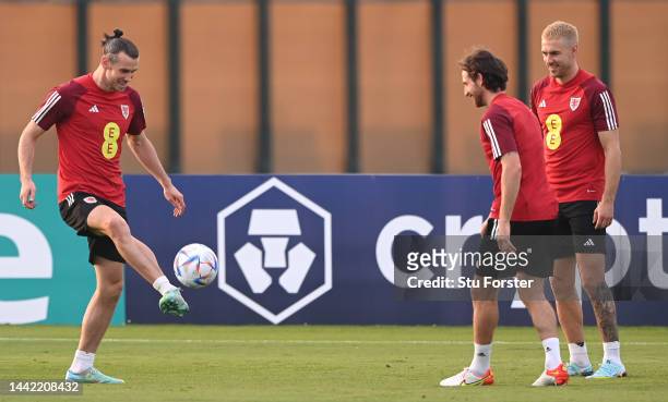 Wales captain Gareth Bale with Aaron Ramsey and Joe Allen during the Wales Training Session at Al Sad Sports Club on November 17, 2022 in Doha, Qatar.