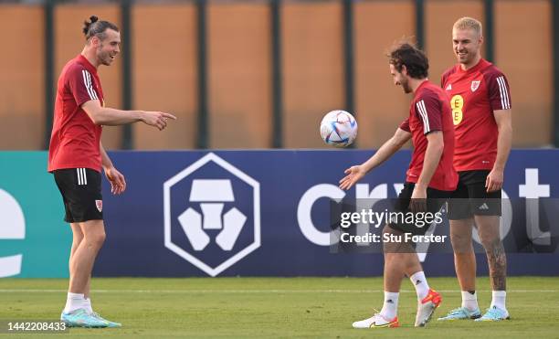 Wales captain Gareth Bale with Aaron Ramsey and Joe Allen during the Wales Training Session at Al Sad Sports Club on November 17, 2022 in Doha, Qatar.