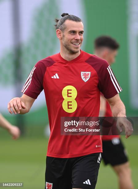 Wales captain Gareth Bale smiles during the Wales Training Session at Al Sad Sports Club on November 17, 2022 in Doha, Qatar.