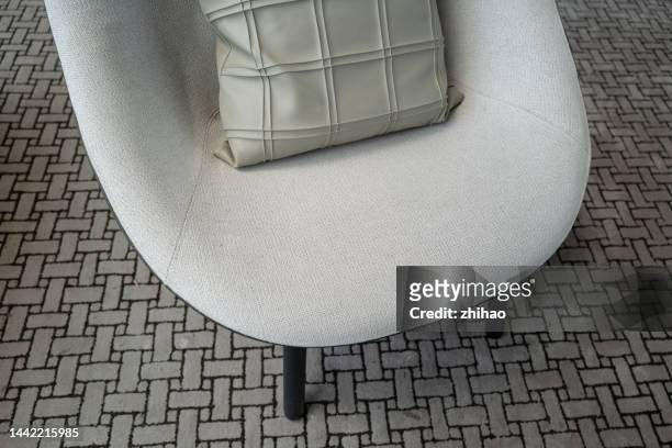 looking down on a chair with pillows - employability stock pictures, royalty-free photos & images