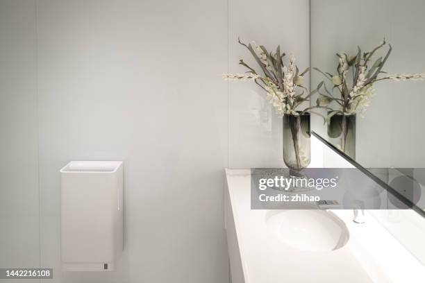 hand dryer and hand basin - hand dryer stock pictures, royalty-free photos & images