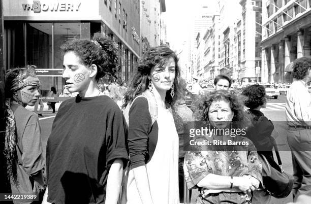 Portrait of four pro-choice activists during a counter-protest to an ongoing pro-abortion march on Fifth Avenue, New York, New York, September 30,...