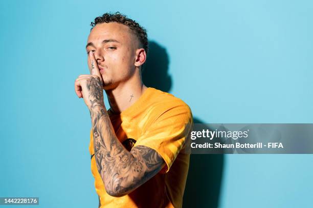 Noa Lang of Netherlands poses during the official FIFA World Cup Qatar 2022 portrait session at on November 16, 2022 in Doha, Qatar.