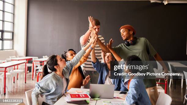 High Five Course 628 College Student High Five Stock Photos, High-Res Pictures, and ...