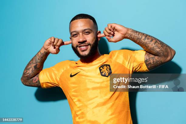Memphis Depay of Netherlands poses during the official FIFA World Cup Qatar 2022 portrait session at on November 16, 2022 in Doha, Qatar.