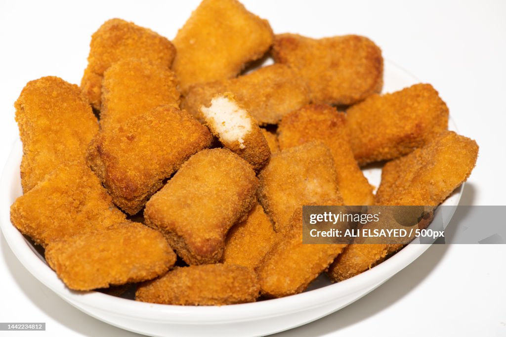 Fried chicken nuggets isolated on white background,Qatar