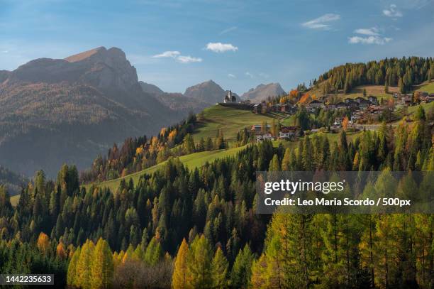 scenic view of trees and mountains against sky,colle santa lucia,belluno,italy - colle santa lucia stock pictures, royalty-free photos & images