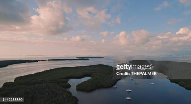 boat moored at the florida keys - islamorada key drone view - monroe county florida stock pictures, royalty-free photos & images