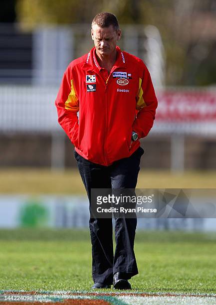 Guy McKenna, coach of the Suns looks on before the round seven AFL match between the Greater Western Sydney Giants and the Gold Coast Suns at Manuka...