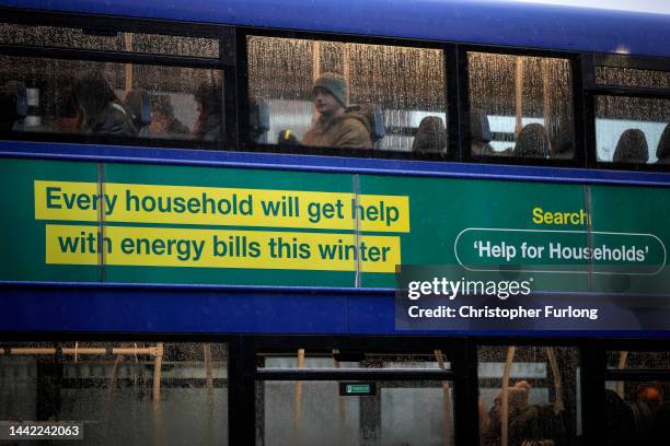 Government advert offering people help with energy bills adorns the side of a bus in the centre of Bolton on November 17, 2022 in Bolton, England....