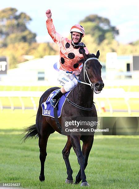 Jockey Luke Nolen riding Black Caviar celebrates after winning the Distinctive Homes Goodwood during Distinctive Homes Goodwood Handicap Day at...