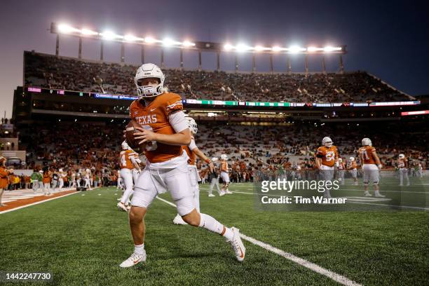 Quinn Ewers of the Texas Longhorns warms up before the game against the TCU Horned Frogs at Darrell K Royal-Texas Memorial Stadium on November 12,...