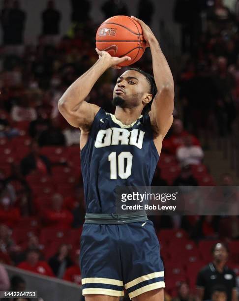 Issac McBride of the Oral Roberts Golden Eagles shoots against the Houston Cougars at Fertitta Center on November 14, 2022 in Houston, Texas.