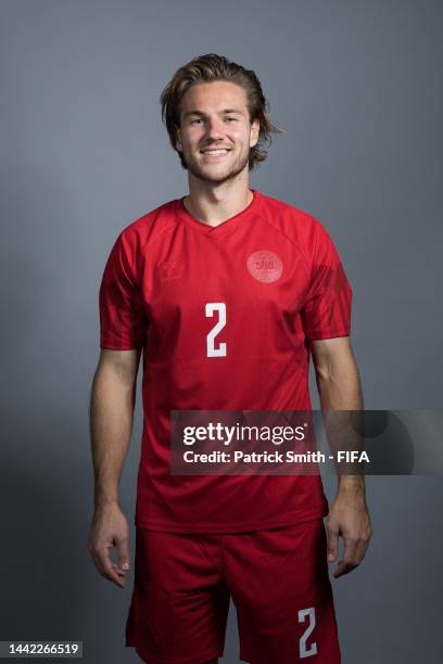 Joachim Andersen of Denmark poses during the official FIFA World Cup Qatar 2022 portrait session on November 17, 2022 in Doha, Qatar.