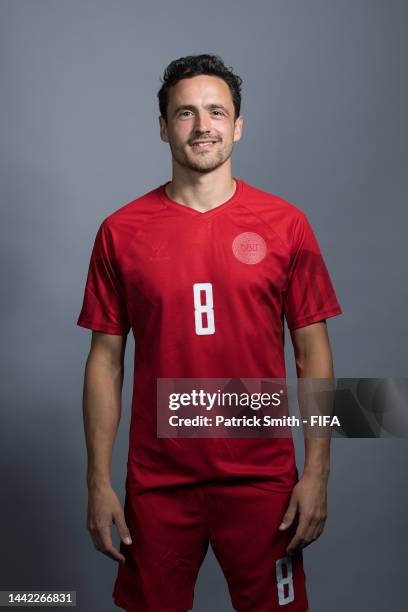 Thomas Delaney of Denmark poses during the official FIFA World Cup Qatar 2022 portrait session on November 17, 2022 in Doha, Qatar.