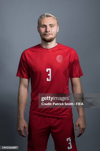Victor Nelsson of Denmark poses during the official FIFA World Cup Qatar 2022 portrait session on November 17, 2022 in Doha, Qatar.