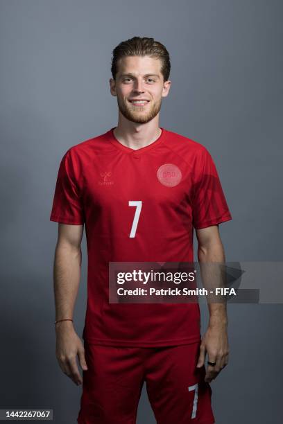 Mathias Jensen of Denmark poses during the official FIFA World Cup Qatar 2022 portrait session on November 17, 2022 in Doha, Qatar.