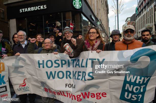 Protesters outside the Starbucks at Oxford Street on November 17, 2022 in London, England. Unite, the UK's leading union for hospitality workers has...