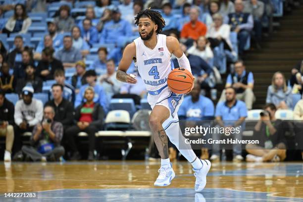 Davis of the North Carolina Tar Heels moves the ball against the Gardner Webb Runnin Bulldogs during their game at the Dean E. Smith Center on...