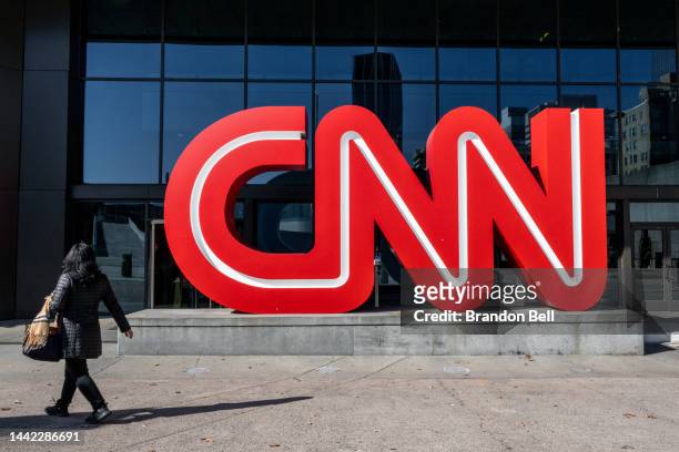 Person walks past the headquarters for the Cable News Network on November 17, 2022 in Atlanta, Georgia. CNN's CEO and Chairman, Chris Licht, has...