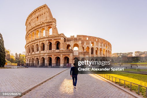 Someone Walking Rome Rear View Of A Man Walking Towards Coliseum Rome Italy High-Res Stock ...