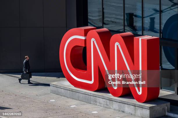 Person walks into the world headquarters for the Cable News Network on November 17, 2022 in Atlanta, Georgia. CNN's CEO and Chairman, Chris Licht,...