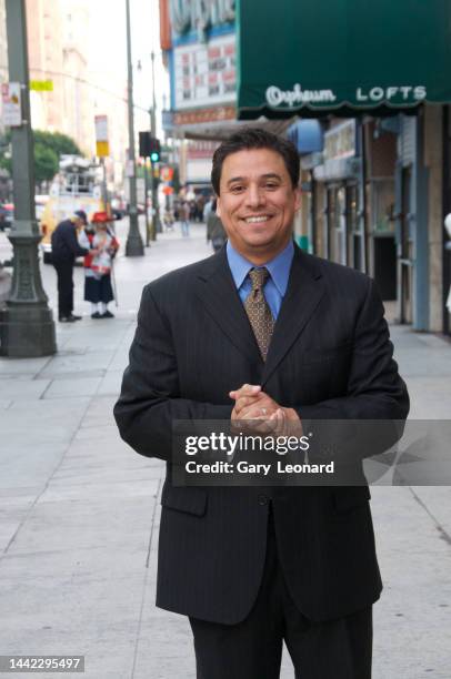 City Council Member José Huizar stands outside the Orpheum Theatre on Broadway smiling with hands cupped as he poses for a portrait on January 25,...