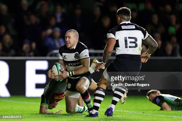 Mike Brown of Barbarians scores their side's third try during the friendly match between Harlequins and Barbarians at The Stoop on November 17, 2022...