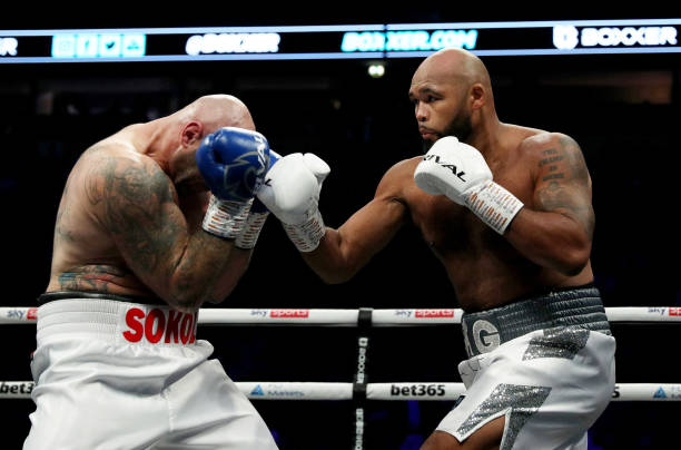 Frazer Clarke punches Kamil Sokolowski during the Heavyweight contest fight between Frazer Clarke and Kamil Sokolowski on the Boxxer fight night at...