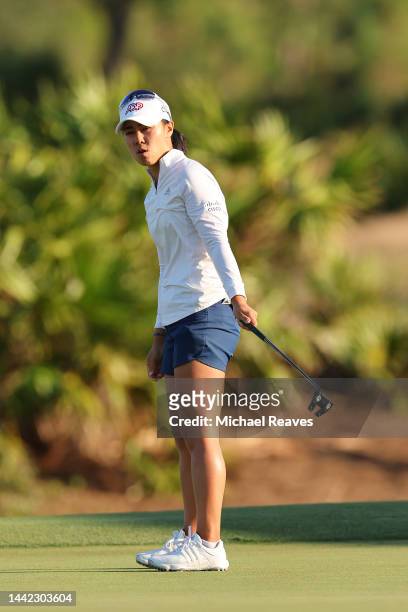Danielle Kang of the United States reacts after missing a putt on the 18th green during the first round of the CME Group Tour Championship at Tiburon...