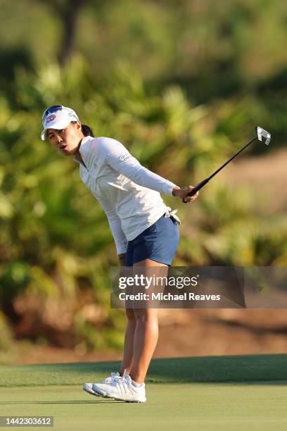 Danielle Kang of the United States reacts after missing a putt on the 18th green during the first round of the CME Group Tour Championship at Tiburon...