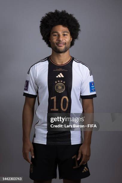 Serge Gnabry of Germany poses during the official FIFA World Cup Qatar 2022 portrait session on November 17, 2022 in Doha, Qatar.