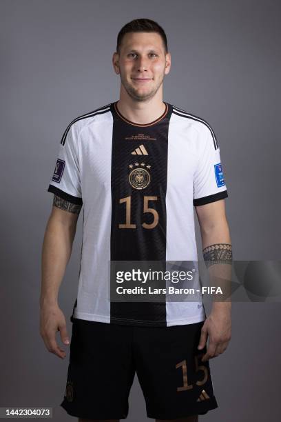 Niklas Suele of Germany poses during the official FIFA World Cup Qatar 2022 portrait session on November 17, 2022 in Doha, Qatar.