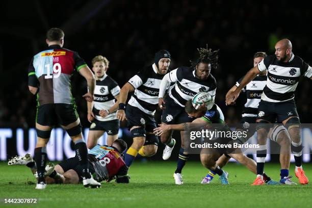 Marland Yarde of Barbarians is tackled during the friendly match between Harlequins and Barbarians at The Stoop on November 17, 2022 in London,...