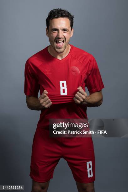 Thomas Delaney of Denmark poses during the official FIFA World Cup Qatar 2022 portrait session on November 17, 2022 in Doha, Qatar.