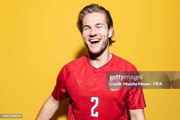 Joachim Andersen of Denmark poses during the official FIFA World Cup Qatar 2022 portrait session on November 17, 2022 in Doha, Qatar.