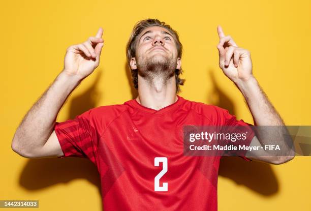 Joachim Andersen of Denmark poses during the official FIFA World Cup Qatar 2022 portrait session on November 17, 2022 in Doha, Qatar.