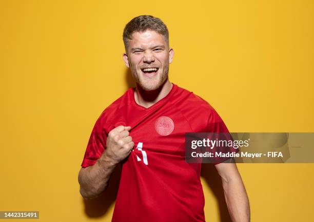 Andreas Cornelius of Denmark poses during the official FIFA World Cup Qatar 2022 portrait session on November 17, 2022 in Doha, Qatar.