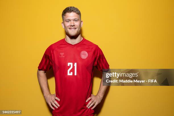 Andreas Cornelius of Denmark poses during the official FIFA World Cup Qatar 2022 portrait session on November 17, 2022 in Doha, Qatar.