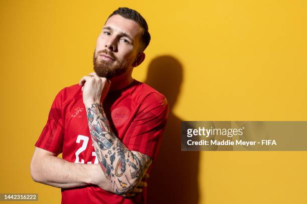 Pierre-emile Hojbjerg of Denmark poses during the official FIFA World Cup Qatar 2022 portrait session on November 17, 2022 in Doha, Qatar.