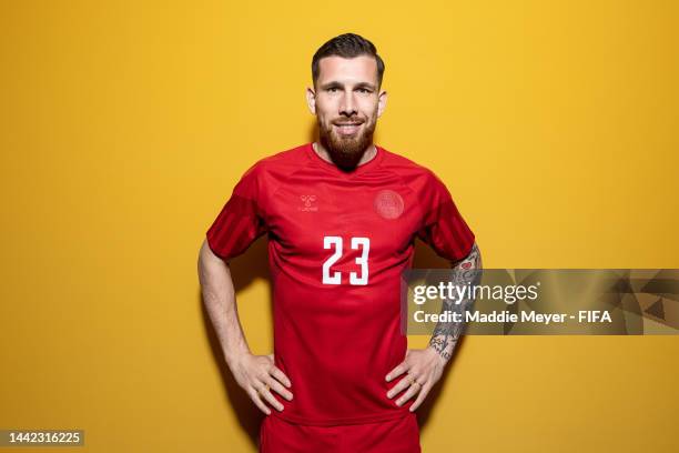 Pierre-emile Hojbjerg of Denmark poses during the official FIFA World Cup Qatar 2022 portrait session on November 17, 2022 in Doha, Qatar.