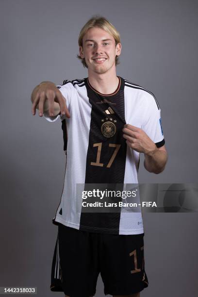 Julian Brandt of Germany poses during the official FIFA World Cup Qatar 2022 portrait session on November 17, 2022 in Doha, Qatar.