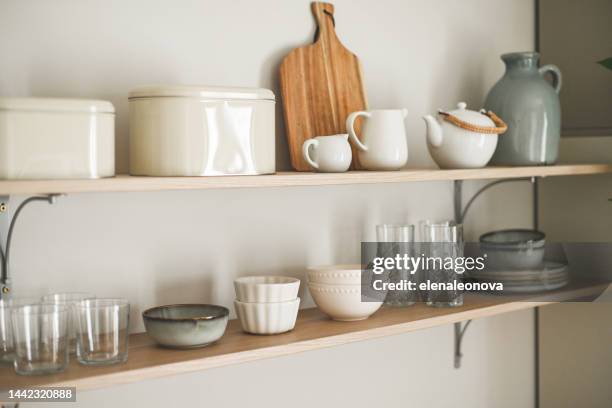 interior of home kitchen and kitchen utensils - glas serviesgoed stockfoto's en -beelden