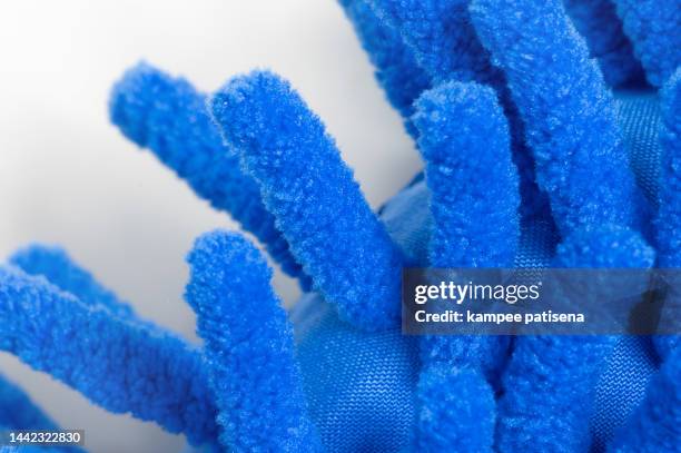 full frame shot of blue textile cleaning equipment - mikrofaser stock-fotos und bilder