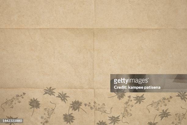 abstract background from texture of brown toilet paper. - wrapped in toilet paper stock-fotos und bilder