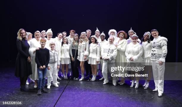 Andrew Castle and Ukrainian Refugees Yulia and Sofia, who have lived with Castle for the last six months, pose with the cast of "Elf The Musical",...