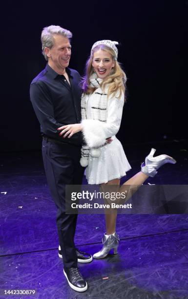 Andrew Castle poses with daughter Georgina Castle as he attends a performance of "Elf The Musical" with Ukrainian Refugees Yuliia Ivanova and Sofia...