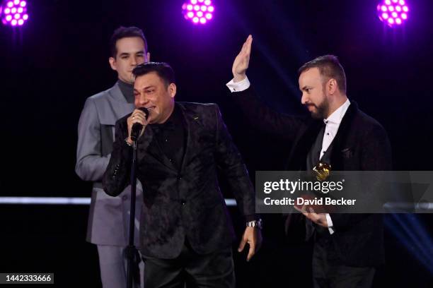 Jean Carlos Centeno and Ronal Urbina accept the Best Cumbia/Vallenato award for "Feliz Aniversario" onstage during the Premiere Ceremony for The 23rd...